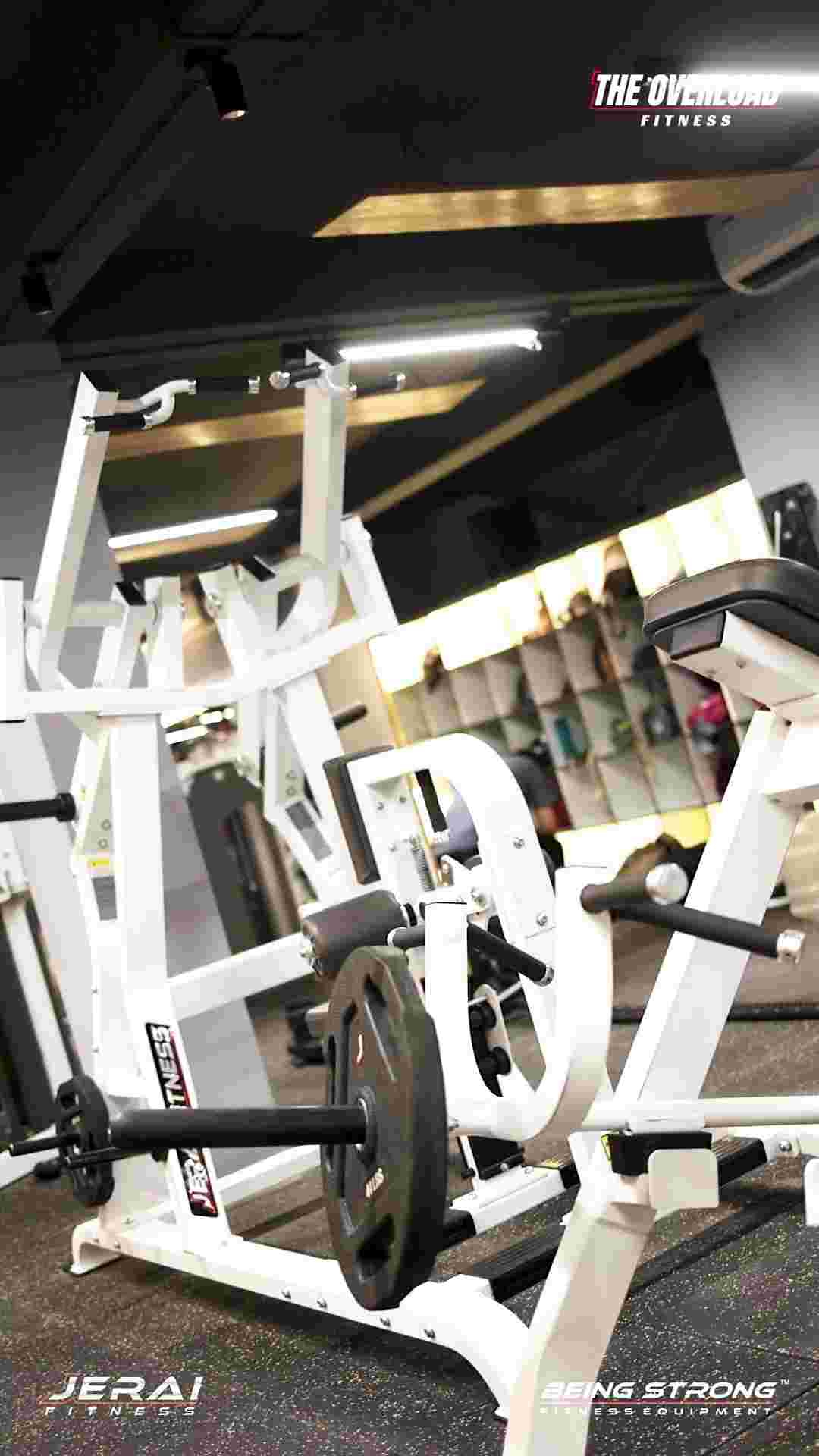 White strength equipment inside The Overload Fitness